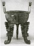 Иньский бронзовый округлый котел-<em>дин</em> с тремя ножками