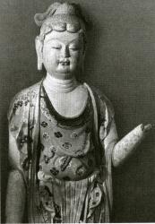 <em>Статуя Бодхисаттвы с отчетливыми приметами внешней женственности (пещерный храм Могао, VIII в.)</em>